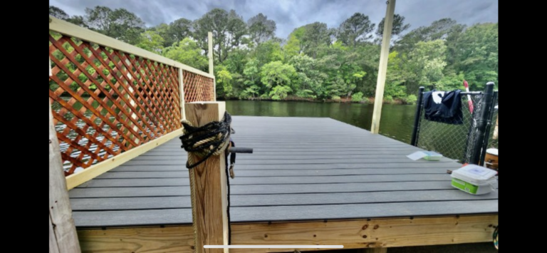 Floating dock with composite decking and a lattice screen