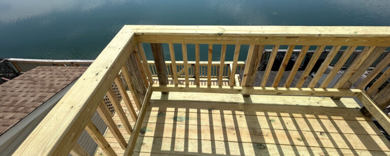 New deck railing at a waterfront home