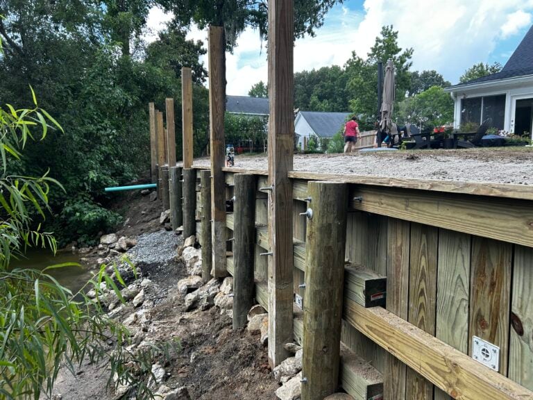 New bulkhead with pilings and riprap