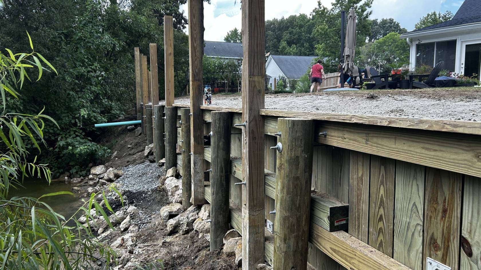 Rebuilt bulkhead and new dock pilings at a Charleston waterfront home