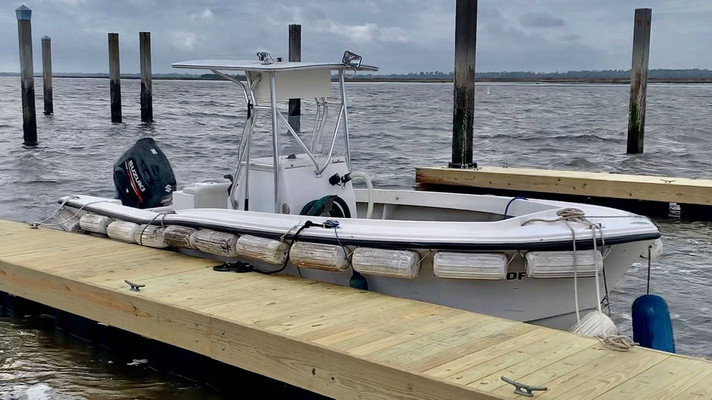 Center console boat tied to a new floating dock built by Charleston Dock Doctors